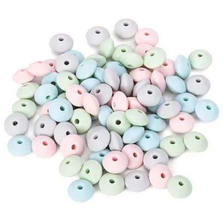 Linseformede silikonperler i pastellfarger
